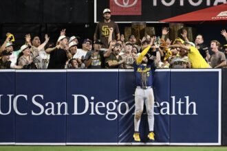 Mitchell's late HR robbery helps seal win, as Brewers set rematch with L.A.