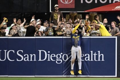 Mitchell's late HR robbery helps seal win, as Brewers set rematch with L.A.