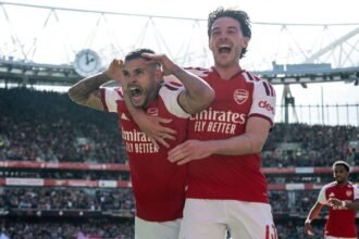 Arsenal fight back to win as Premier League resumes under cloud of Man City's guilty verdict