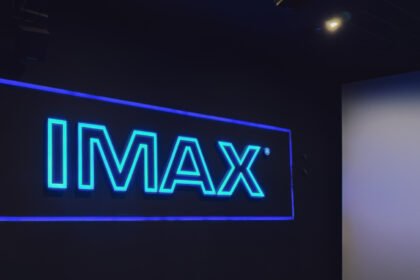 Are there any disadvantages to using IMAX theaters?