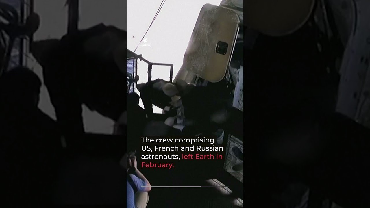 Four astronauts return to earth after an eight-month space mission