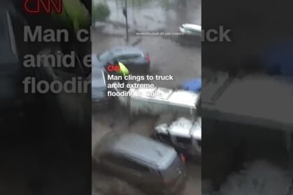 Man clings to truck amid extreme flooding in Chile