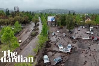 Heavy rain hits Chile's capital damaging vehicles and homes
