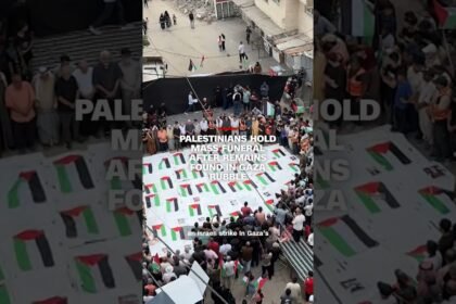 Palestinians hold mass funeral after remains found in Gaza rubble