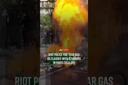 Riot police fire tear gas as clashes with students in Paris escalate