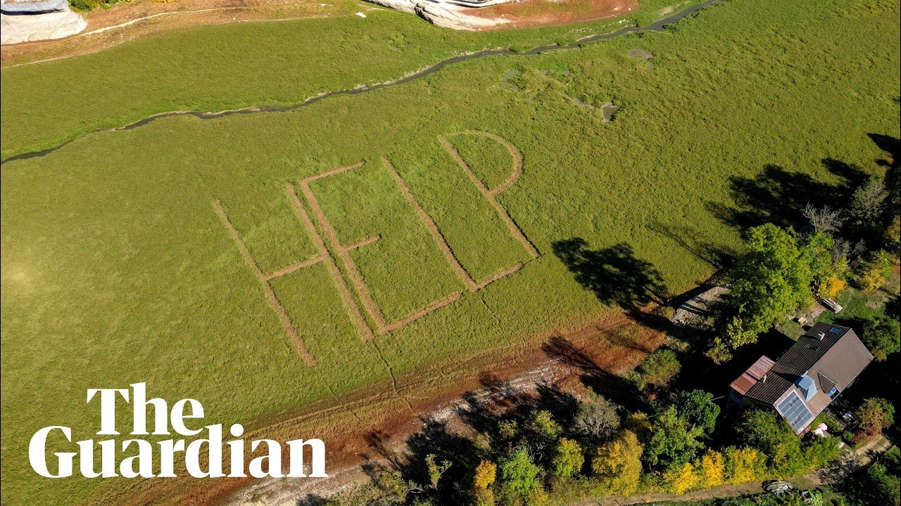 Giant 'HELP' sign emerges on drought-stricken Swiss lakebed