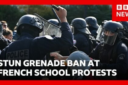 Stun grenades banned in French student protests after teenager's hand blown off | BBC News
