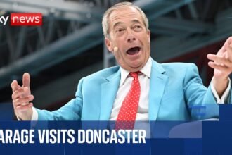 Nigel Farage speaks at Reform 100 Days Tour rally