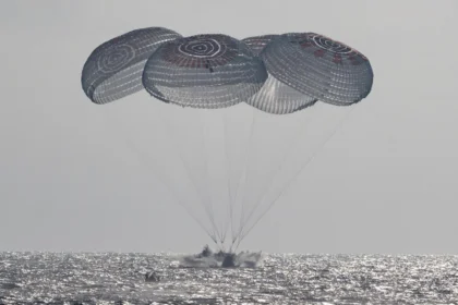 NASA astronauts splash down after 100 million miles in space