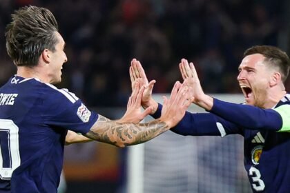 Third time lucky for Pocognoli as Scotland make Robertson's 100th cap with win