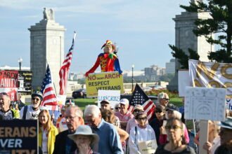 As Trump's proposed arch looms over D.C., protesters pin their hopes on the midterms