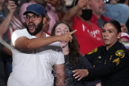 Trump interrupted by protesters as he fights to rally Texas voters